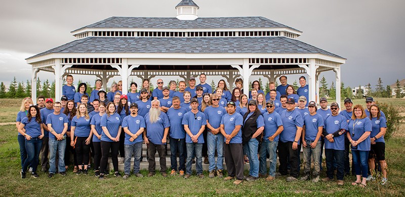 staff members in front of gazebo